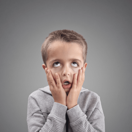 blonde child rolling his eyes