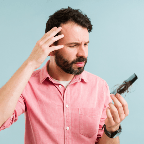 man brushing hair