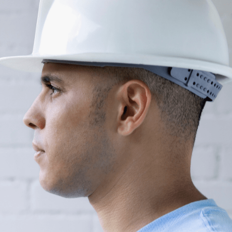 man wearing safety hat at work